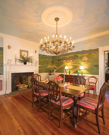 Painted scenes of Ben Lomond and Tappahannock as they appeared in the 1700s adorn the walls of the formal dining room. Photography by Roger Foley.